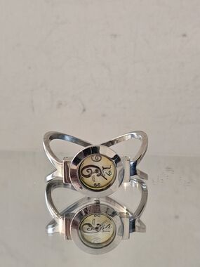 Silver-Tone Cuff Bracelet with Yellow Accent Dial